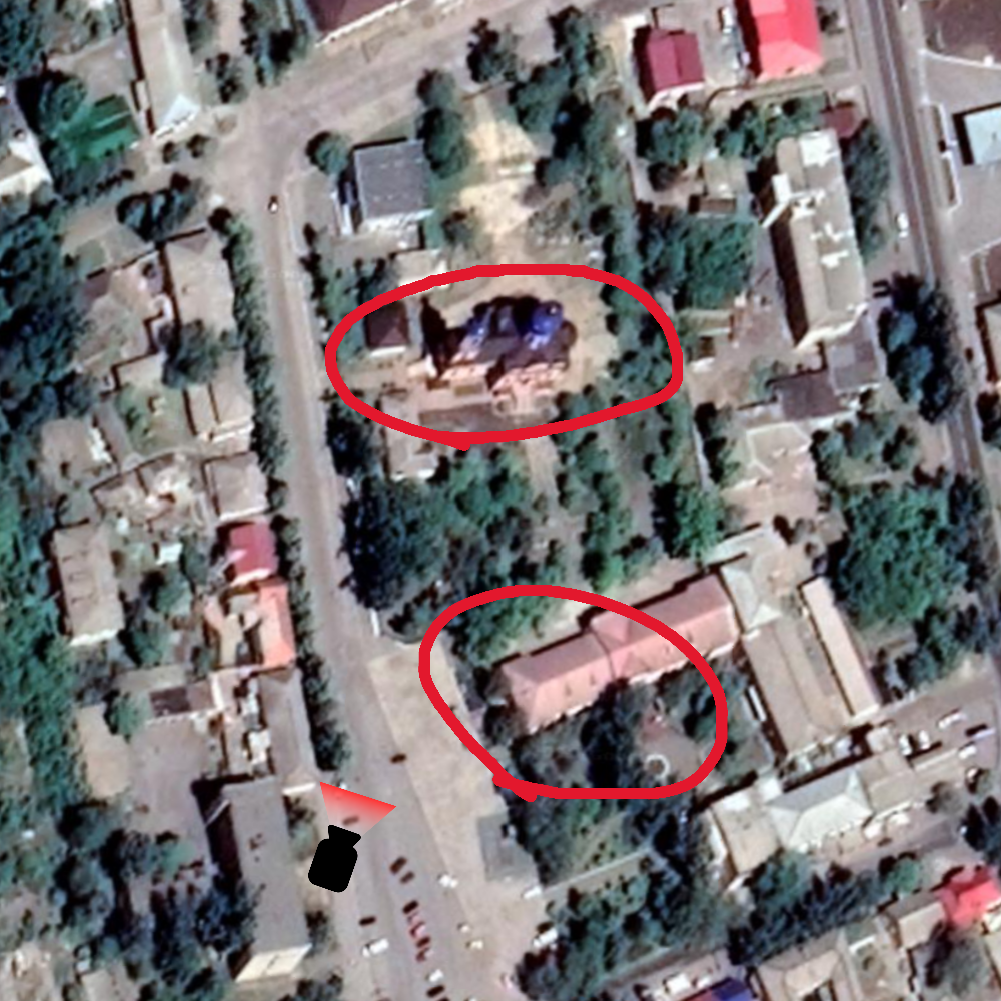Bird's-eye satellite view of the area around Svyato-Pokrovskyy Khram in Orikhiv, with the exact location marked.