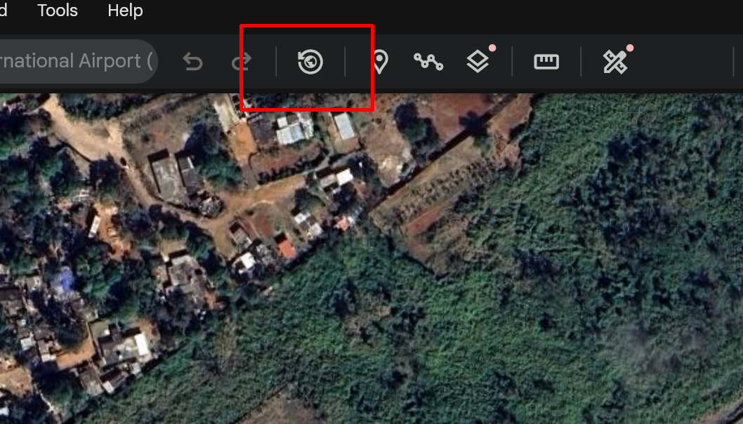 Google Earth toolbar with the historical imagery clock icon highlighted by a red box.